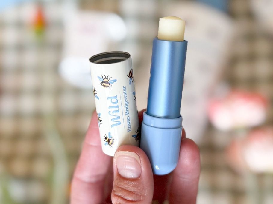 Hand holding a Wild Refillable Lip Balm
