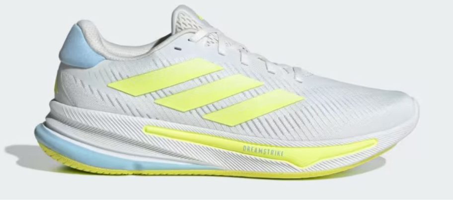 yellow, blue, and white adidas Men's Supernova Ease Running Shoe stock image