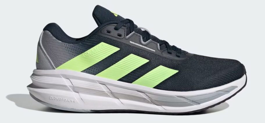 black and yellow adidas Men's Questar 3 Running Shoe stock image