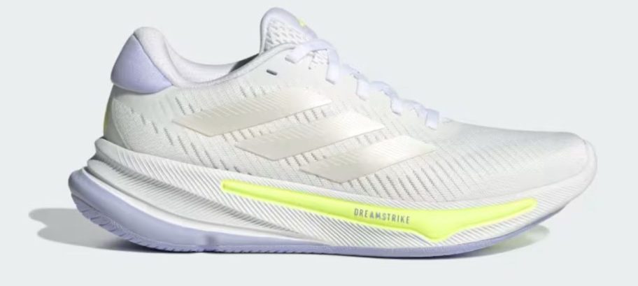 yellow and white adidas Women's SuperNova Ease Running Shoe stock image