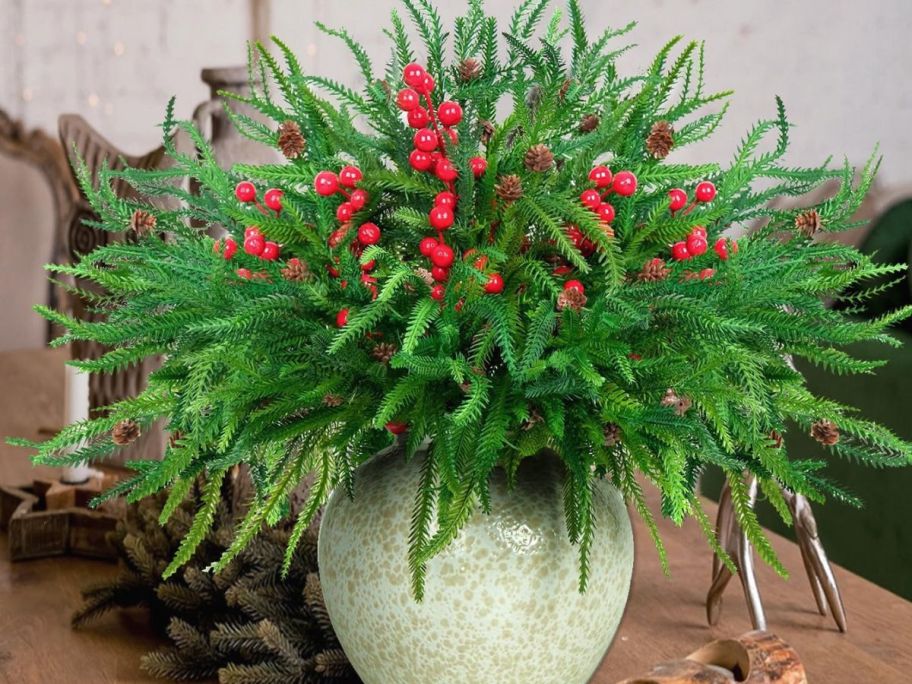 Artificial Norfolk Pine Branches in pot on table