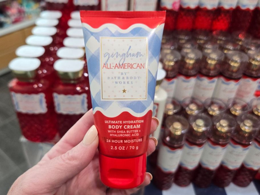 Bath & Body Works Gingham All-American Travel Size Body Cream in hand in store