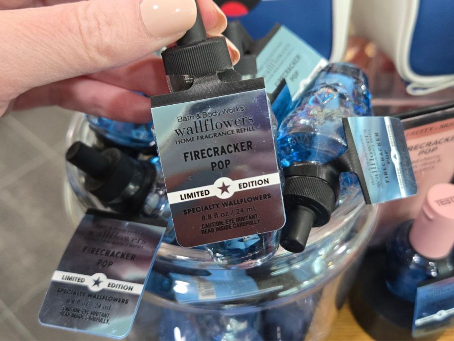 Bath & Body Works Firecracker Pop Wallflowers Fragrance Refill in hand in store
