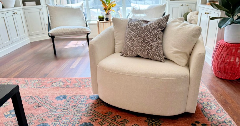 cream swivel chair in a living room