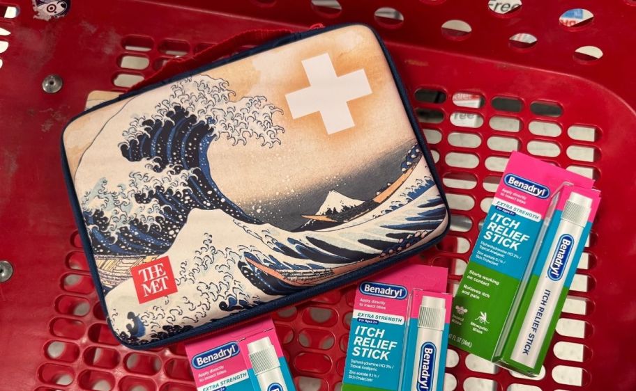 a first aid bag and 3 itch relief sticks in a target shopping cart