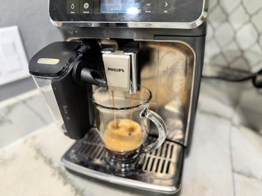 brewing espresso in a phillips automatic espresso machine 