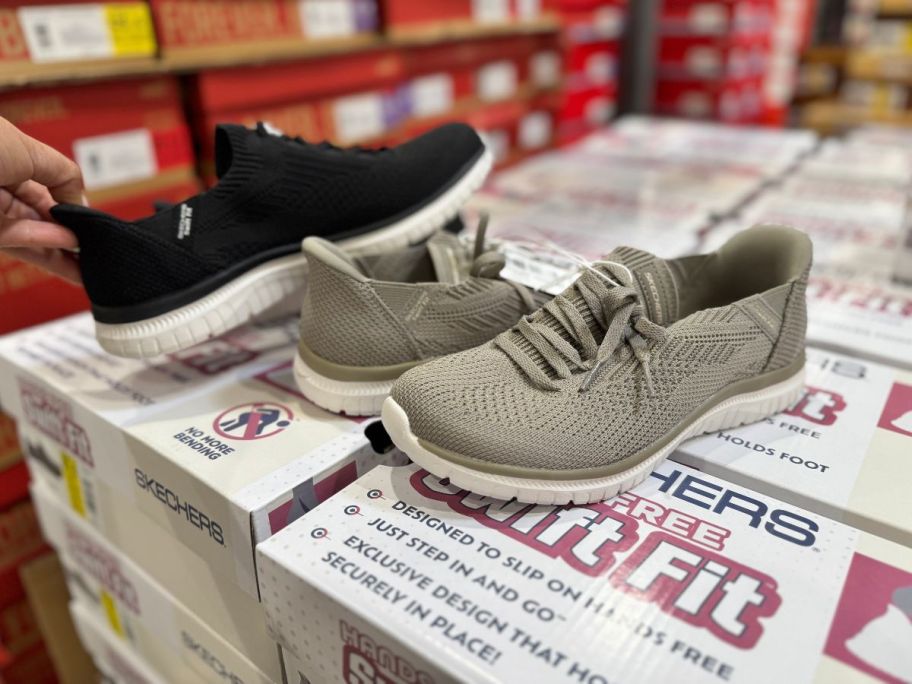 two pairs of Skechers Ladies Virtue Swift Fit Sneakers on boxes in store
