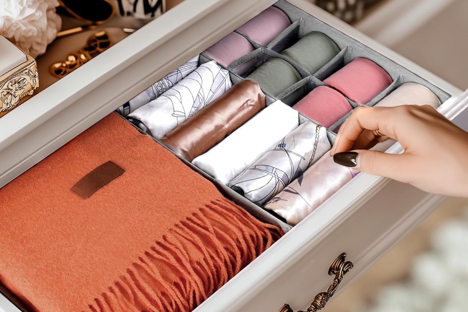 drawer with scarves and clothing with fabric bins