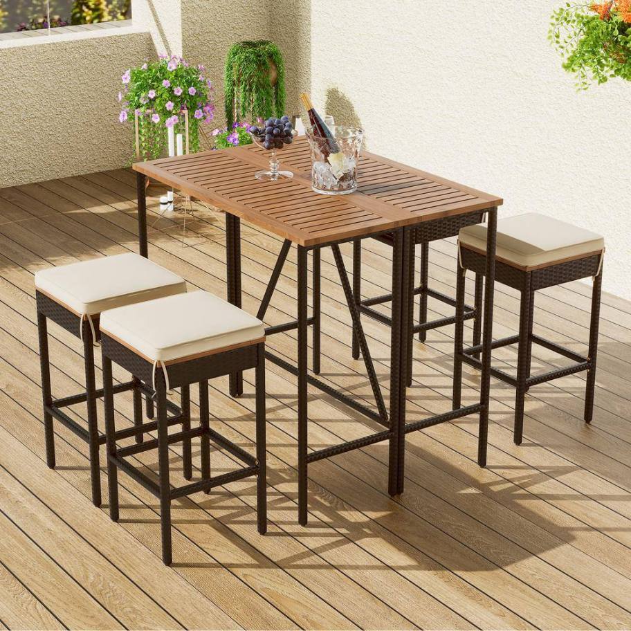 An outdoor table with chairs and cushions