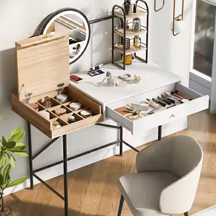white vanity with chair in front 