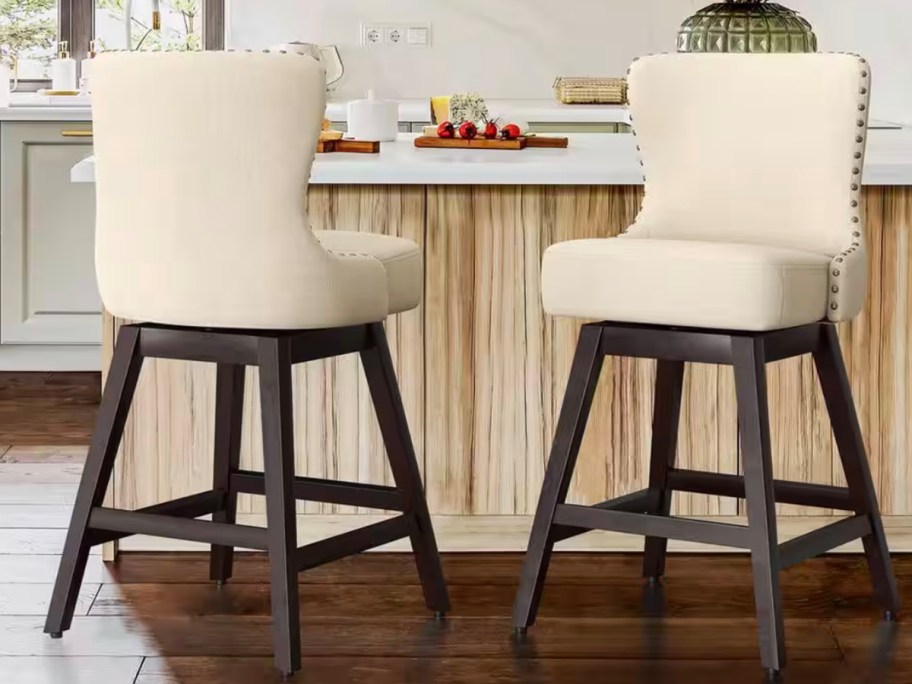 white and brown counterstools at kitchen bar