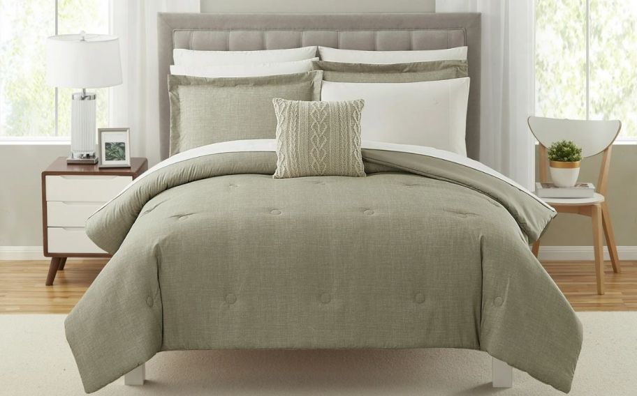 a double bed dressed with a khaki 10-piece bed in a bag set.