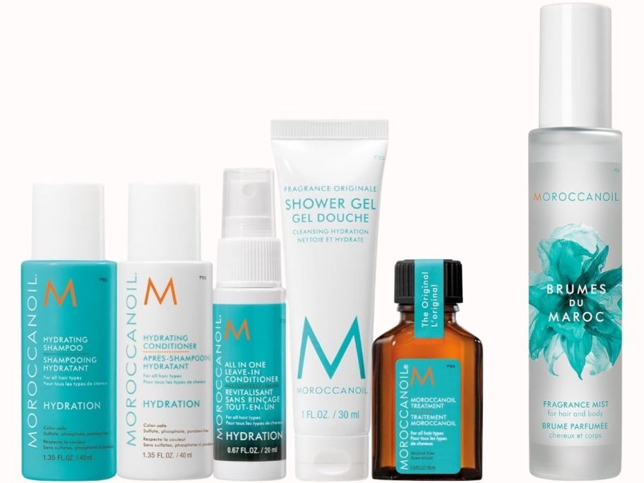 moroccan oil deluxe sampler set items and a bottle of hair and body mist