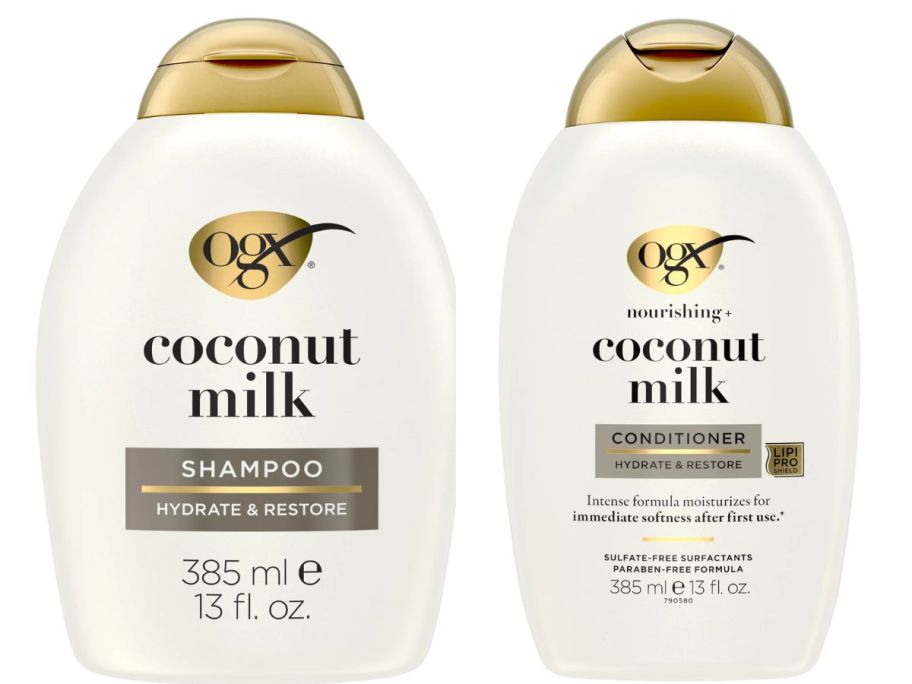OGX Nourishing + Coconut Milk Moisturizing Hair Shampoo and conditioner bottle stock images