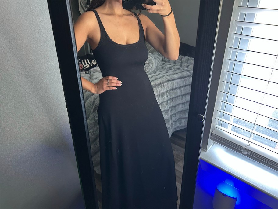 woman wearing black maxi dress 
