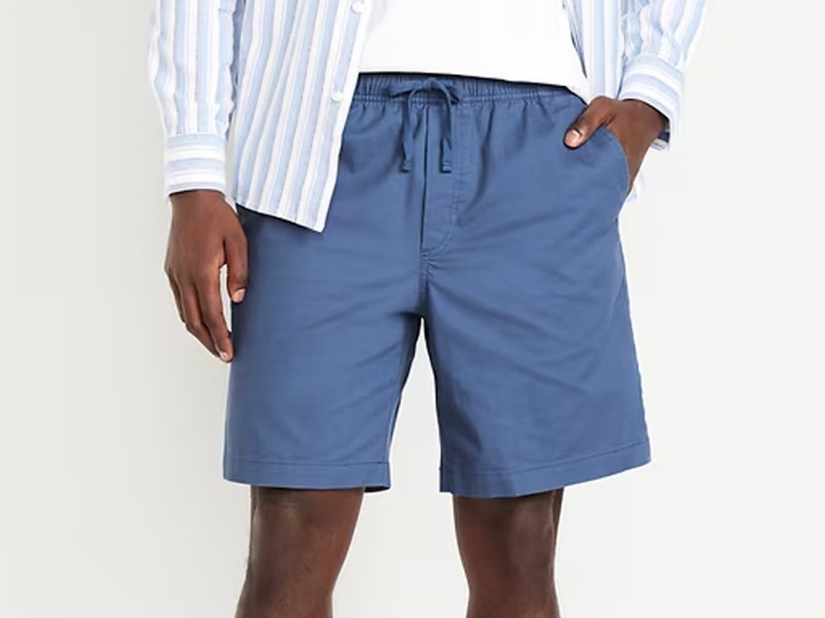 man wearing blue shorts