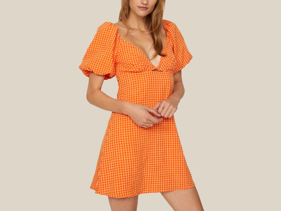 woman wearing orange dress 