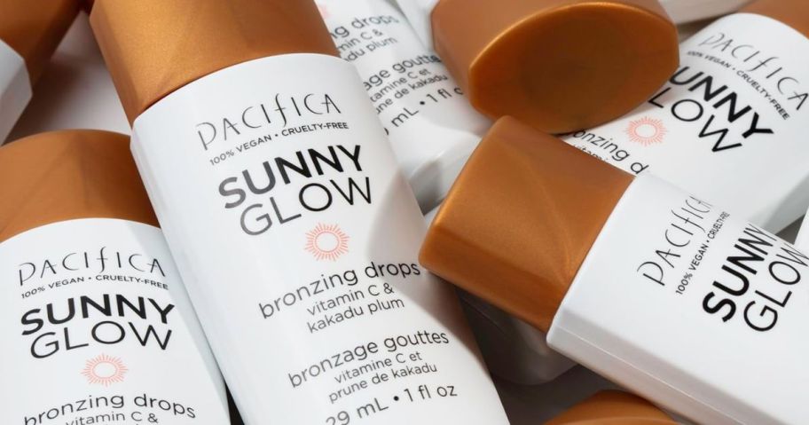 Pacifica Sunny Glow Liquid Face Bronzer Drop bottles laying on top of each other