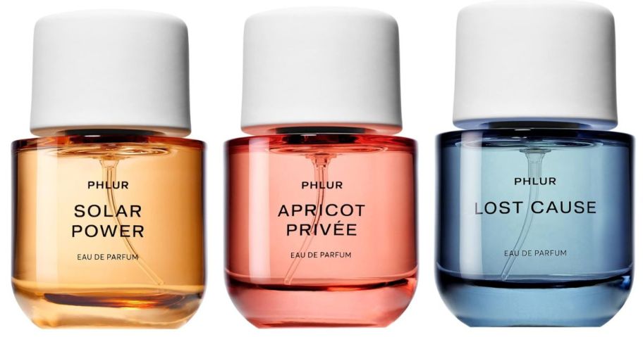three PHLUR Solar Power Eau de Parfum bottles