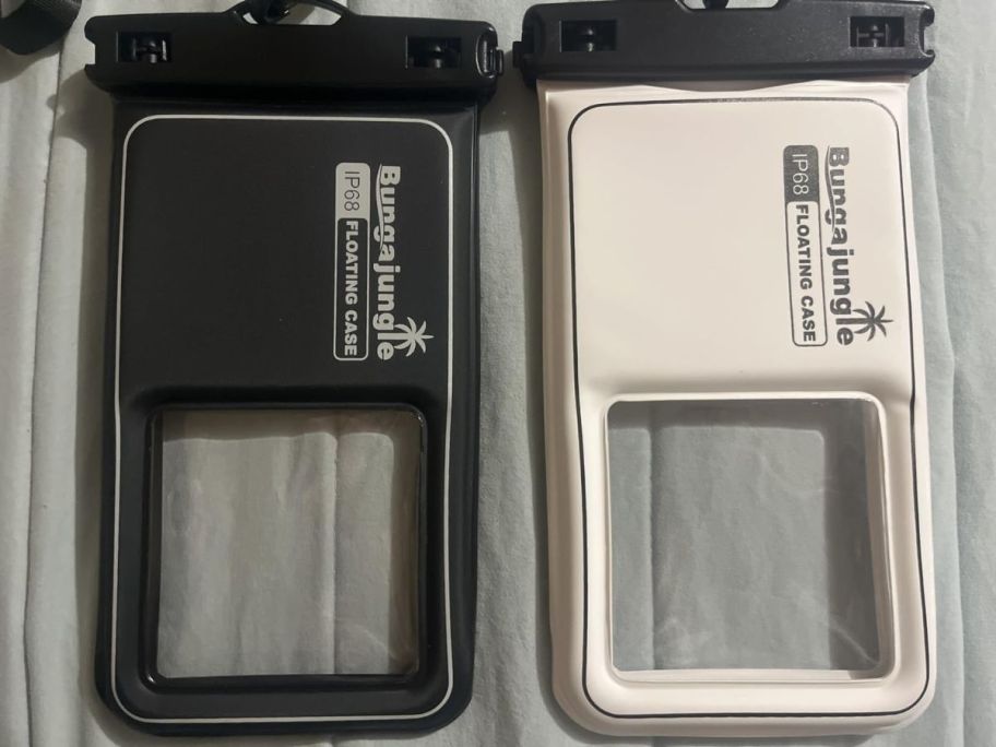 one black and one white waterproof phone cases