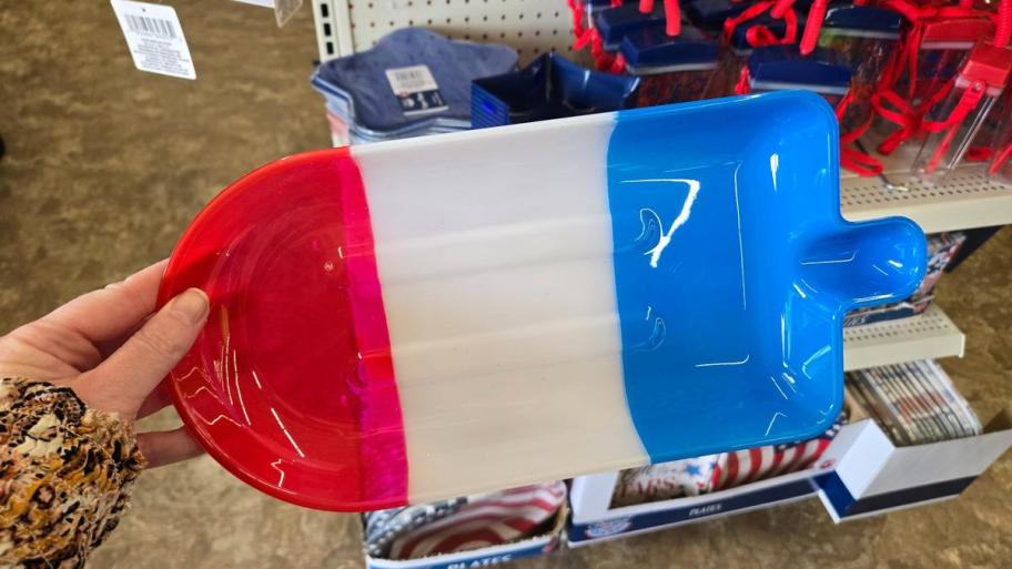Red White and Blue Popsicle Platter being held in an aisle at Dollar Tree
