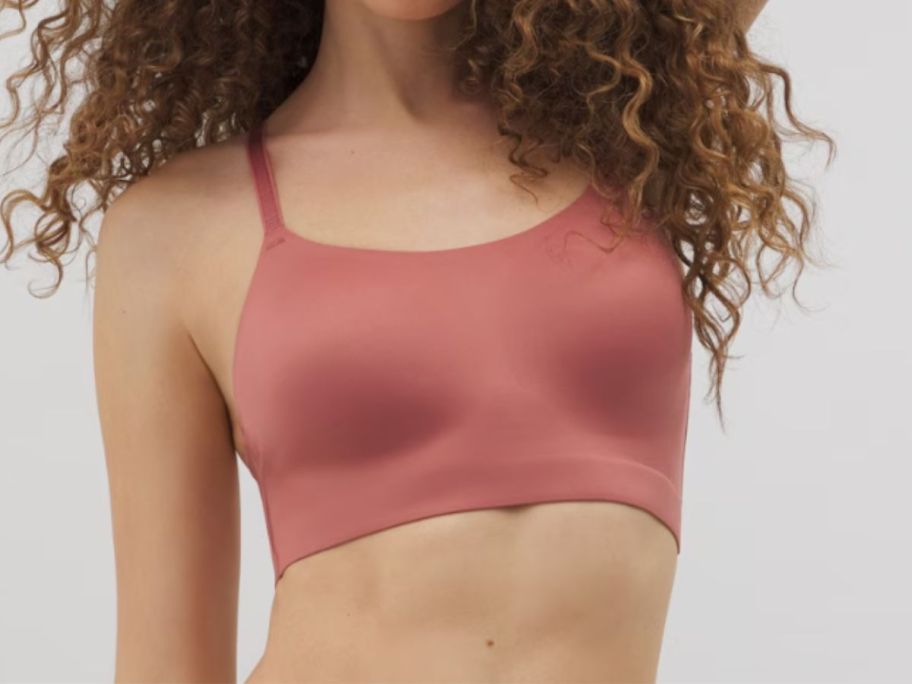 woman wearing Soma Enbliss Luxe Convertible Bralette in pink