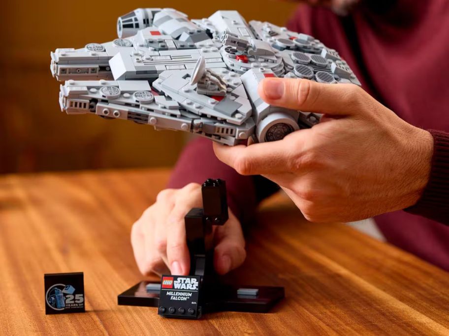star wars lego set in hand above table