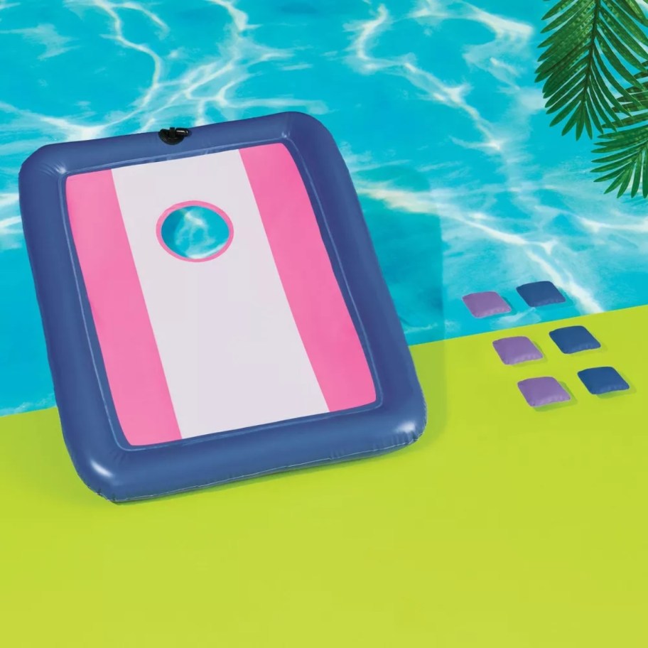 an inflatable cornhole pool game