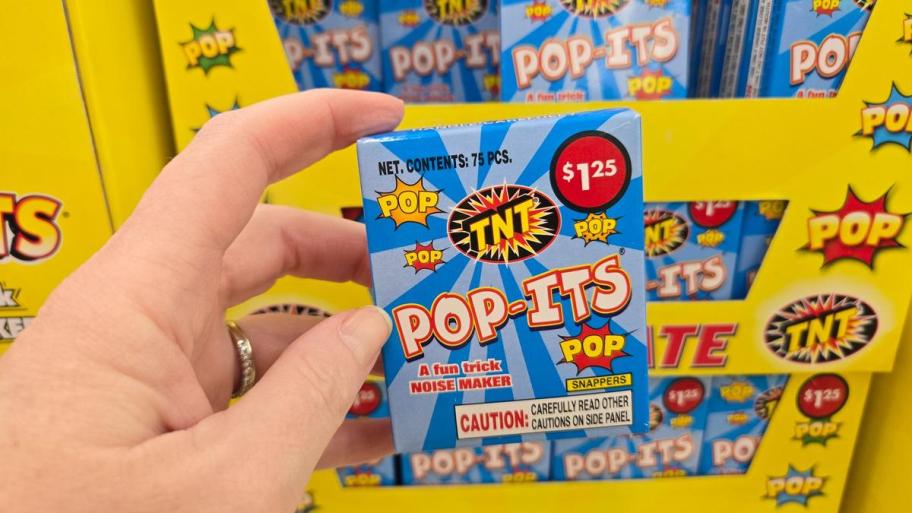 TNT brand Pop-Its noise maker with 75 pieces in a bright blue and yellow box.