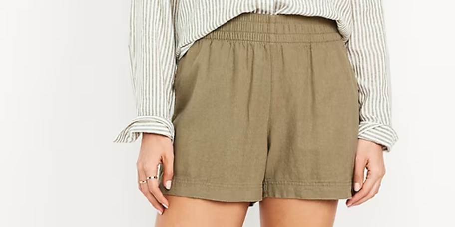 woman wearing tan shorts