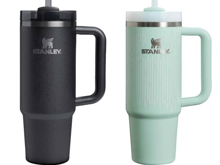 a black and a sage green Stanley tumbler