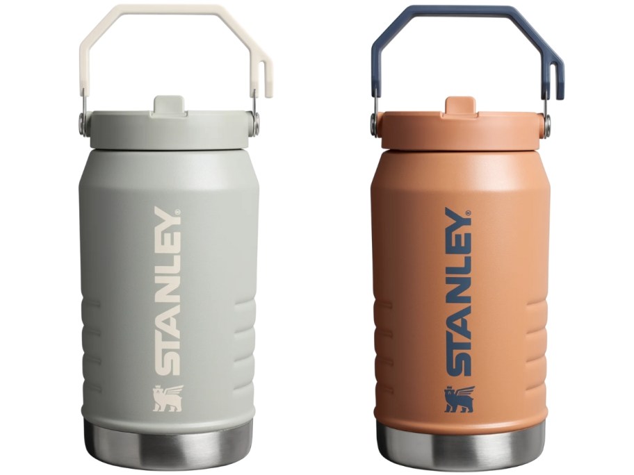 2 large Stanley jugs, one light sage green, the other orange
