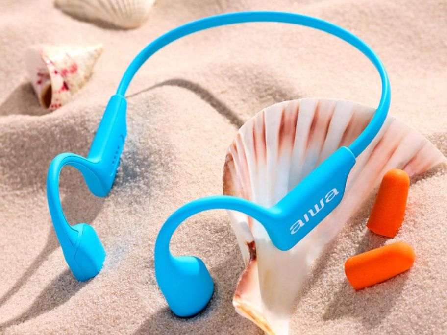 A pair of blue Aiwa Bone Conduction Headphones 