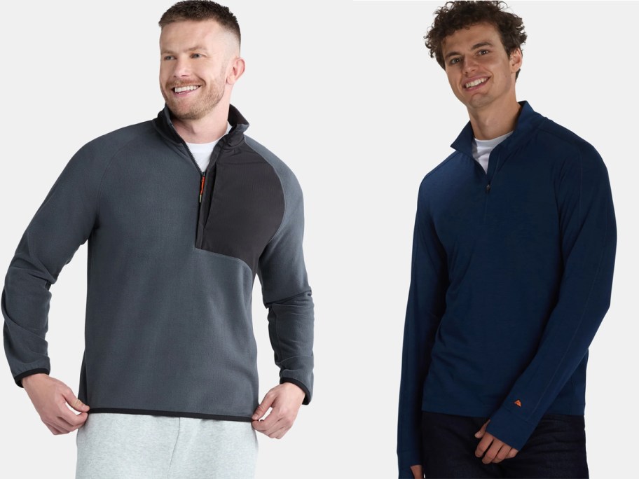 Side-by-side view of two Ozark Trail men's quarter-zip pullovers — one in dark gray fleece with a black chest panel and one in navy blue with a minimalist design, both modeled against a white background.