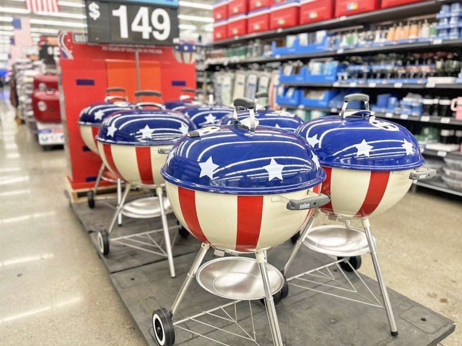 patriotic weber charcoal grills on display in store