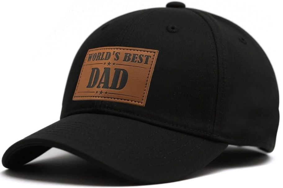 black trucker hat with graphic tag on the front that reads worlds best dad 
