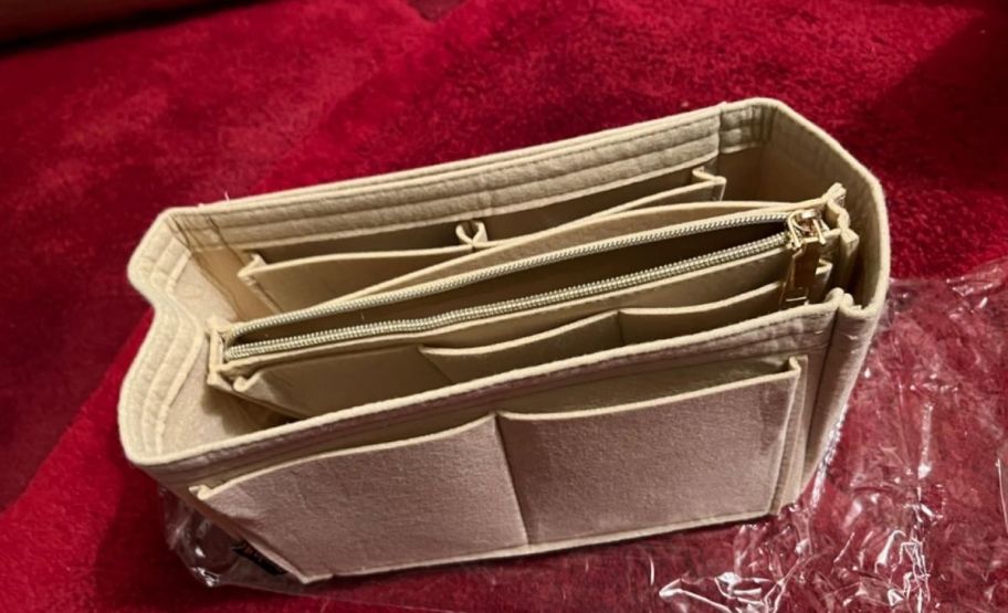 a beige multi pocket handbag organizer insert 