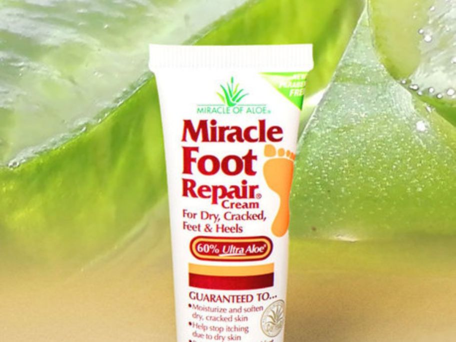 Miracle Foot Repair Cream tube in front of aloe