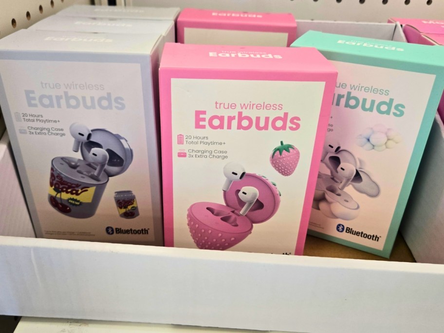 boxes of novelty wired earbuds with cases on a store shelf